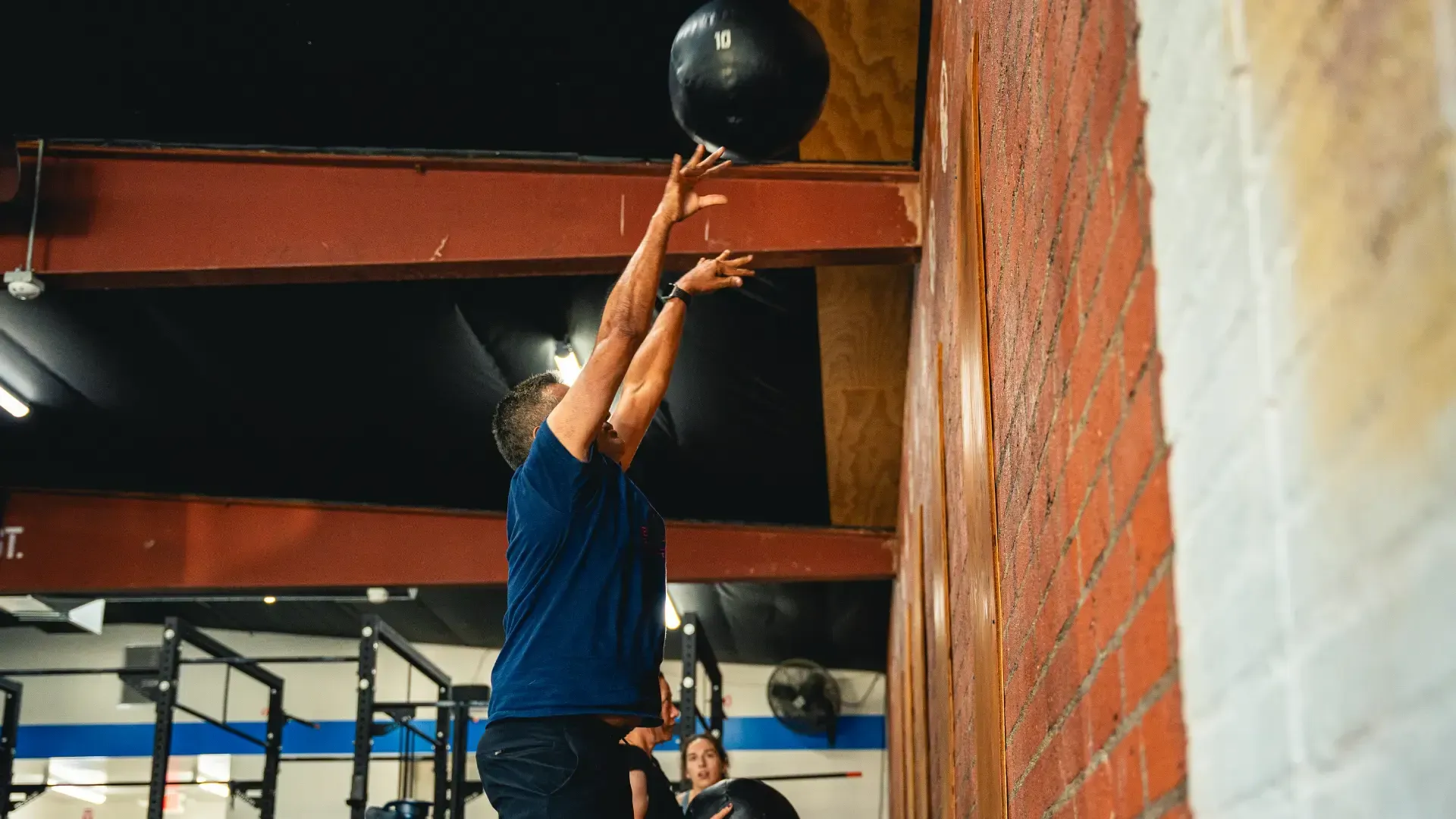 CrossFit 626 athlete performing a wall-ball exercise in San Marino